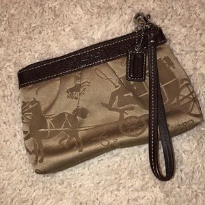 Coach horse and carriage wristlet